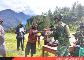 Terpancarnya Keceriaan Masyarakat Papua Dengan Ulah Prajurit Buaya Putih