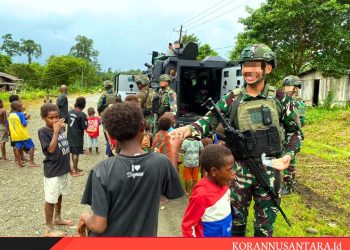 TNI Marinir Sapa Damai Anak-Anak Tomonsatu Penuh Ceria