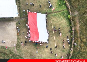 Kemeriahan Kirab Dan Pengibaran Bendera Merah Putih Oleh Habema Dan Masyarakat Sinak