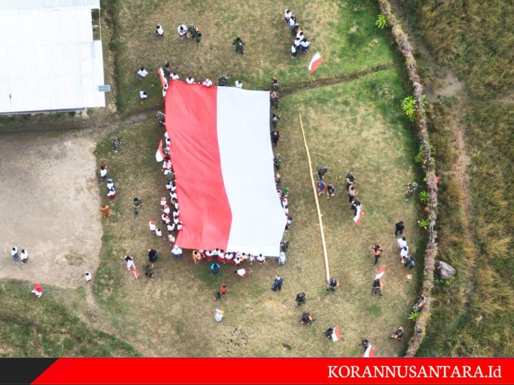 Kemeriahan Kirab Dan Pengibaran Bendera Merah Putih Oleh Habema Dan Masyarakat Sinak