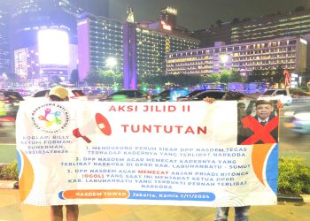 Spanduk Pecat Ogol Berkibar di Bundaran HI Jakarta