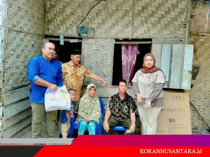 Anggota DPR RI Trinovi Sitorus Berikan Kursi Roda kepada Bu Sri Mulyani di Aek Korsik