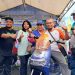 Radian Azhar Serahkan Grand Prize Motor Listrik ke Peserta Jalan Sehat Kahmi Jaya Fest 2025