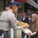 Brimob Metro Jaya Bagikan 50 Paket Sembako ke Warga Ciputat