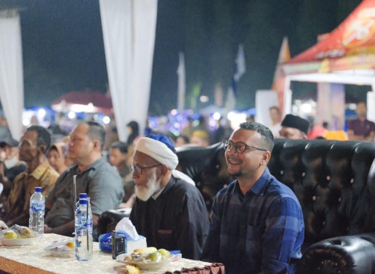Bupati Labusel Hadiri Semarak 35 Tahun Transfest Tandatangani Prasasti Monumen Transmigrasi Teluk Panji IV